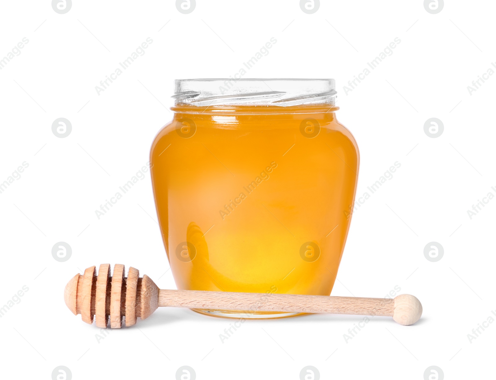 Photo of Tasty natural honey in glass jar and dipper isolated on white