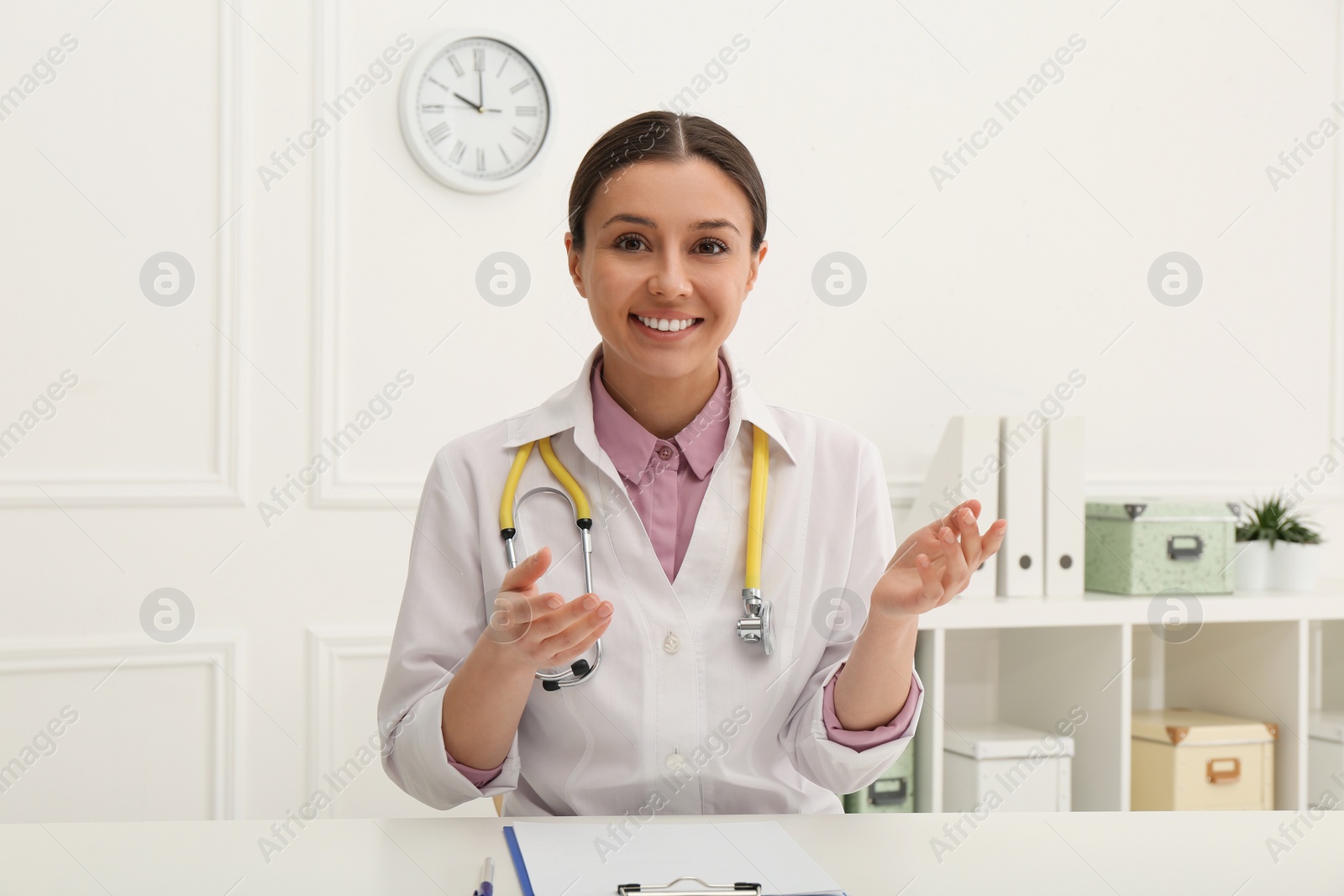 Photo of Pediatrician consulting patient using video chat in clinic, view from webcam