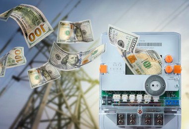 Image of Electricity meters with flying dollar banknotes and high voltage tower outdoors at sunset. Paying bills