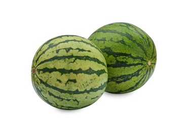 Photo of Two delicious ripe watermelons isolated on white