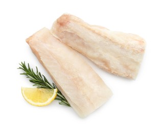 Photo of Fresh raw cod fillets with rosemary and lemon isolated on white, top view