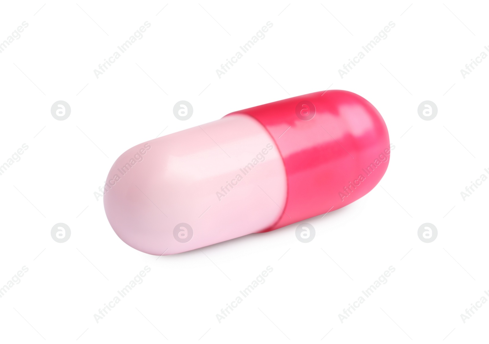 Photo of One pill on white background. Medicinal treatment