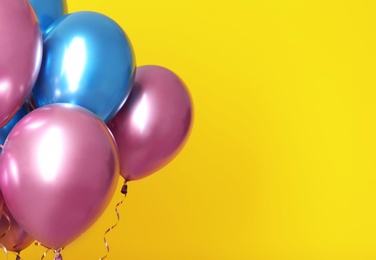 Bunch of balloons on color background. Space for text