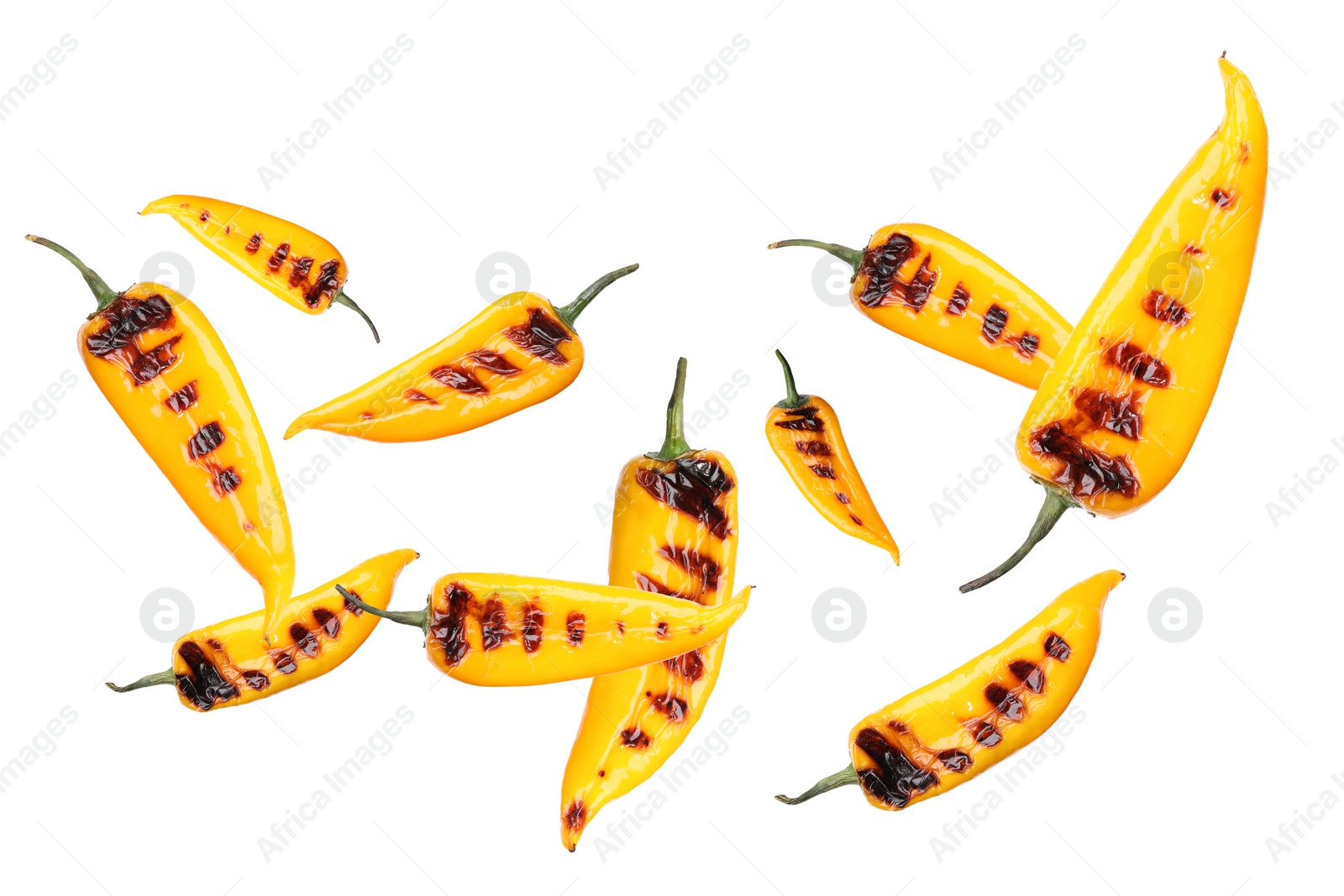 Image of Grilled peppers in air on white background