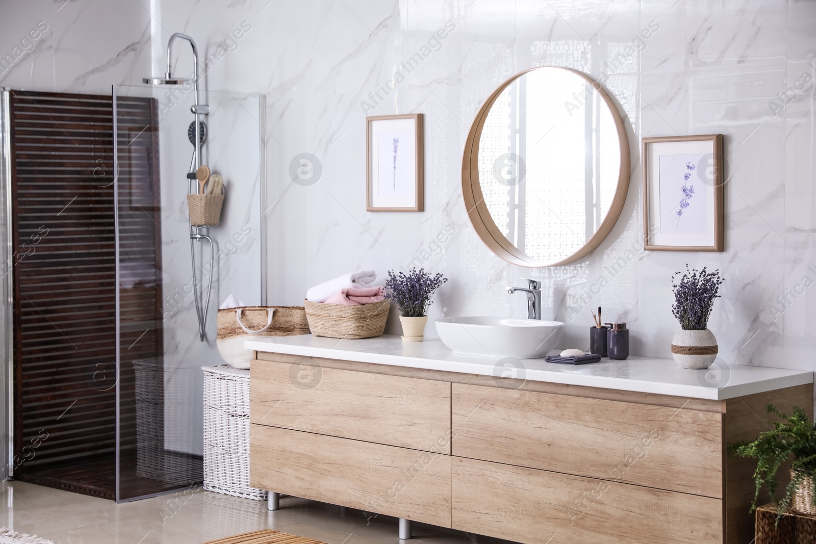 Photo of Bathroom interior with shower stall and counter. Idea for design