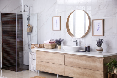 Bathroom interior with shower stall and counter. Idea for design