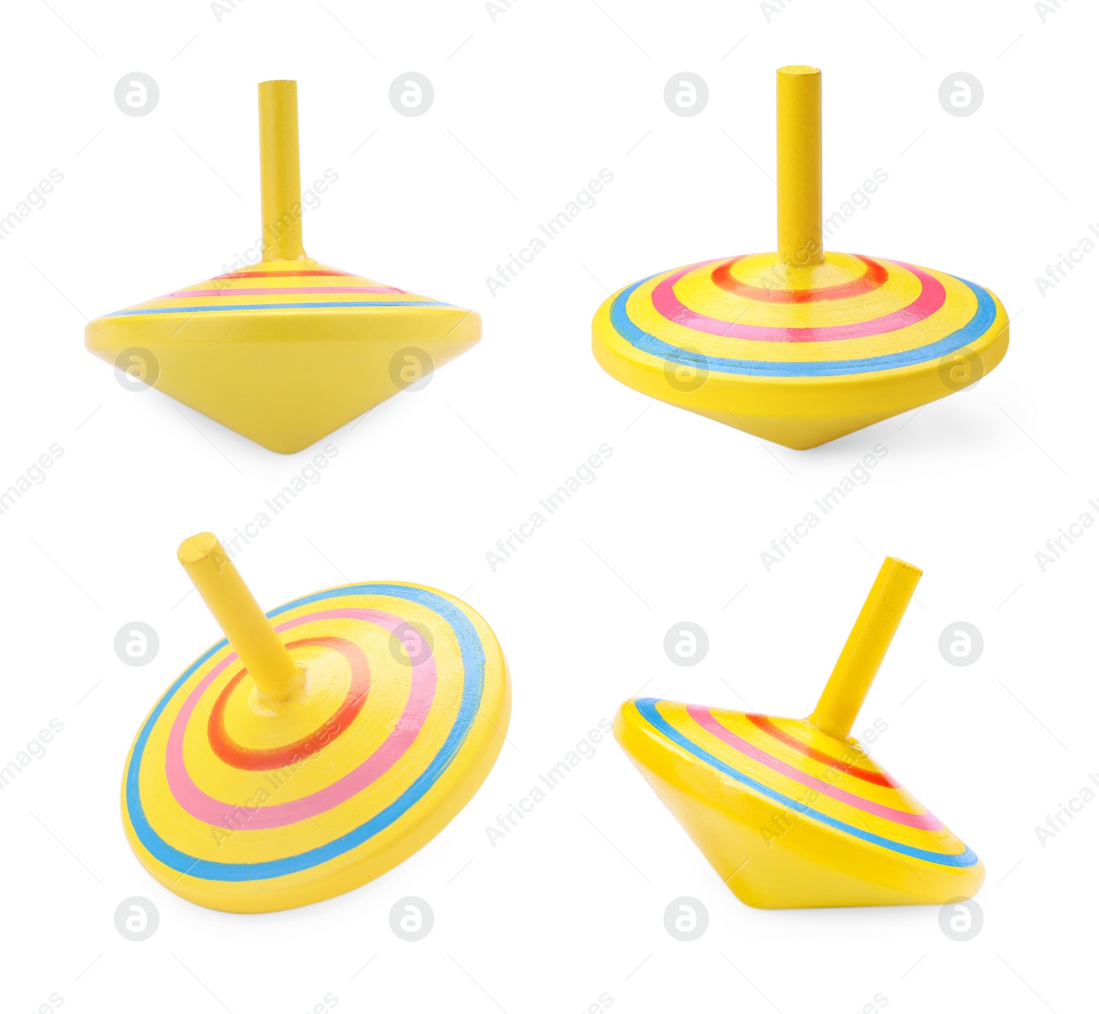 Image of Yellow spinning tops isolated on white. Toy whirligig