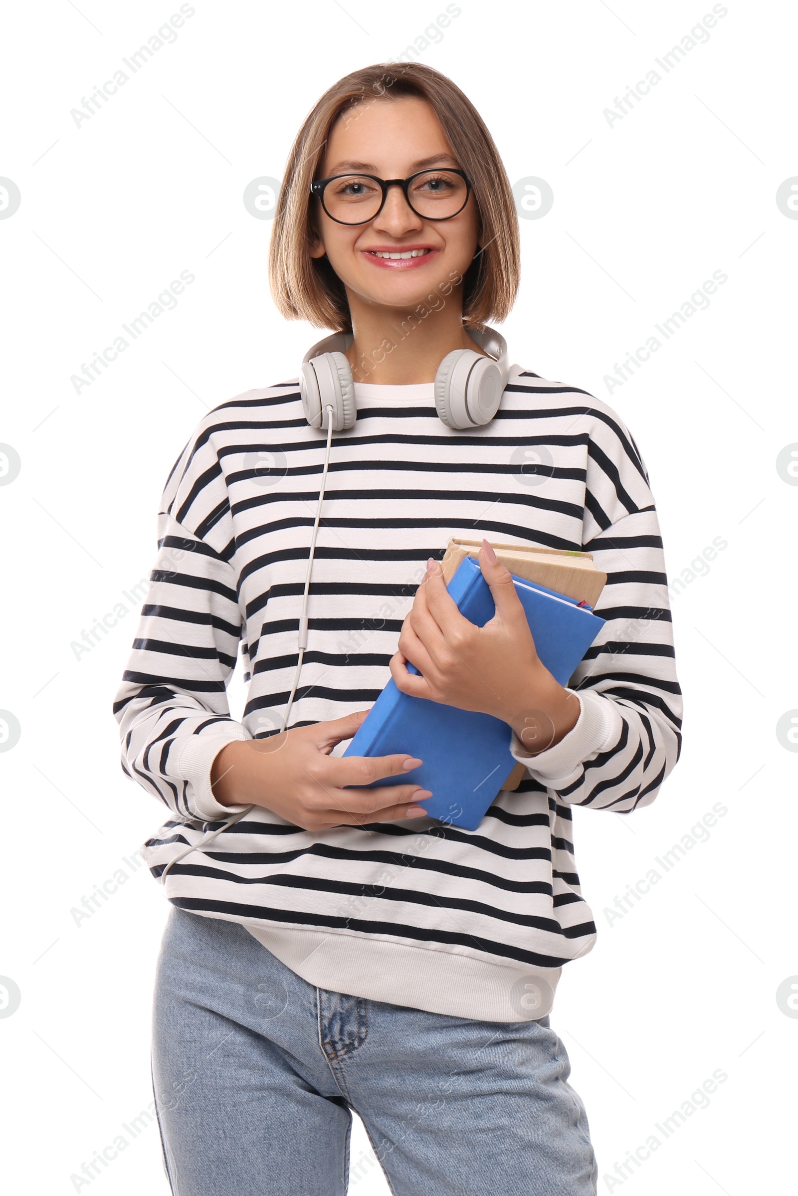 Photo of Young student with books and headphones on white background