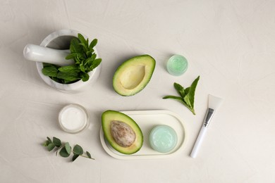 Photo of Flat lay composition with homemade cosmetic products and fresh ingredients on white table
