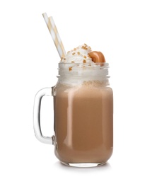 Photo of Mason jar with delicious milk shake on white background