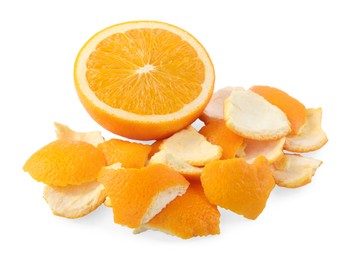 Orange peels preparing for drying and fresh fruit isolated on white