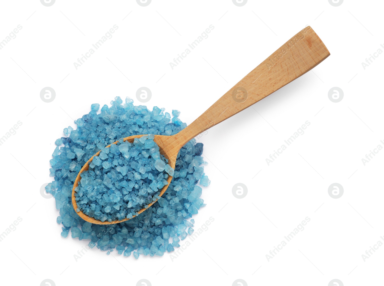 Photo of Blue sea salt and spoon isolated on white, top view