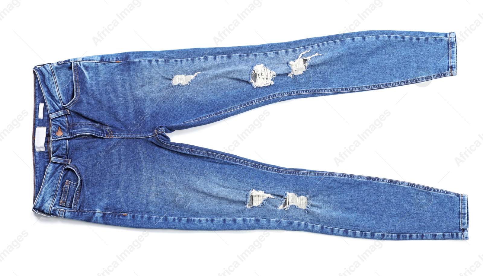 Photo of Stylish jeans on white background, top view