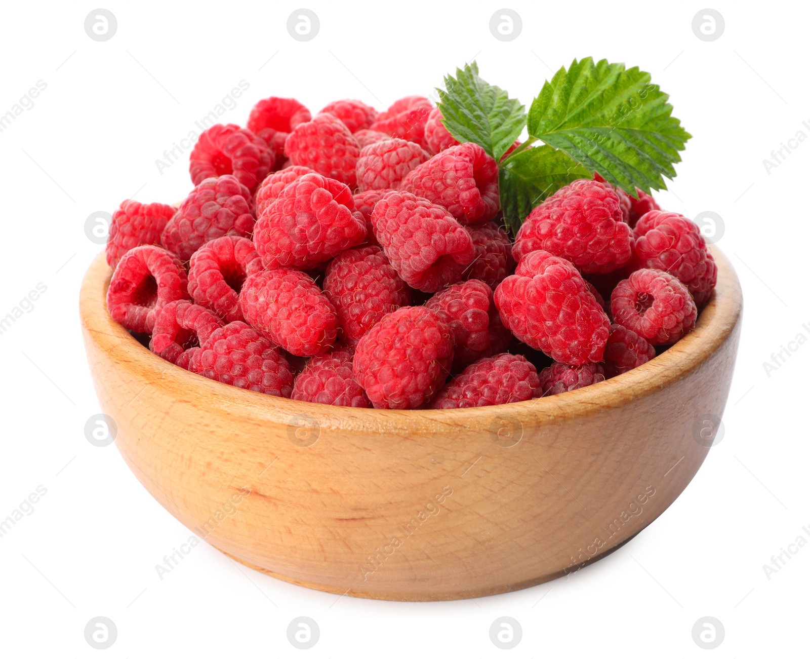 Photo of Bowl of delicious fresh ripe raspberries with leaves on white background