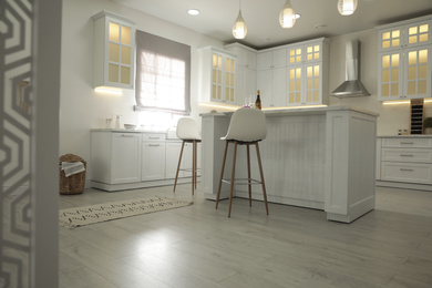 Photo of Modern kitchen with stylish furniture. Interior design