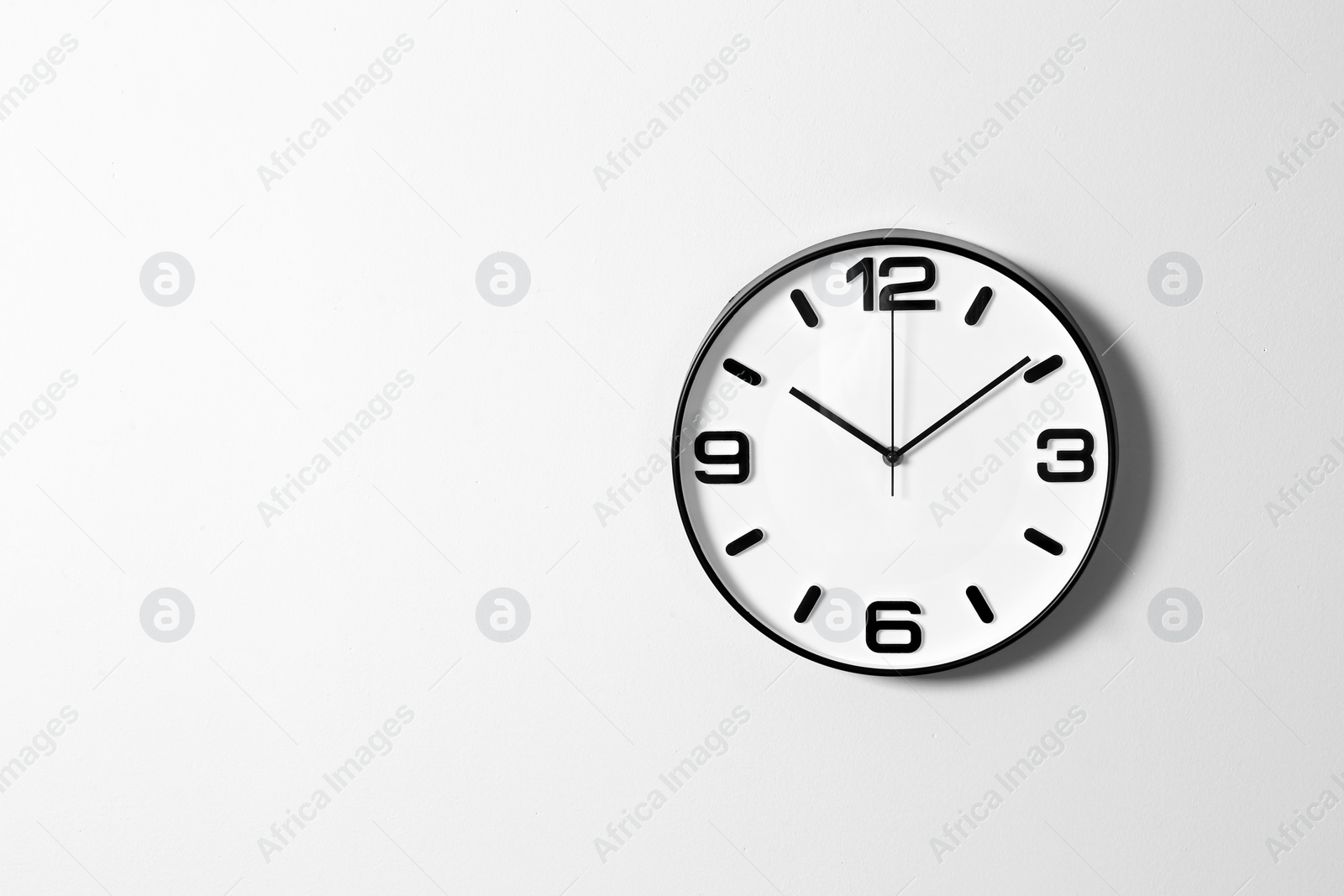 Photo of Stylish clock and space for text on white background. Time management