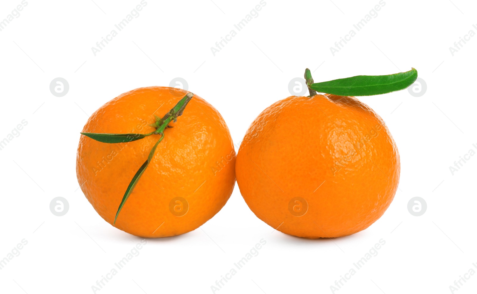 Photo of Fresh ripe juicy tangerines isolated on white