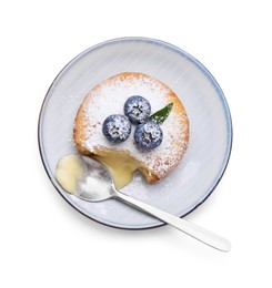 Photo of Tasty vanilla fondant with white chocolate and blueberries isolated on white, top view