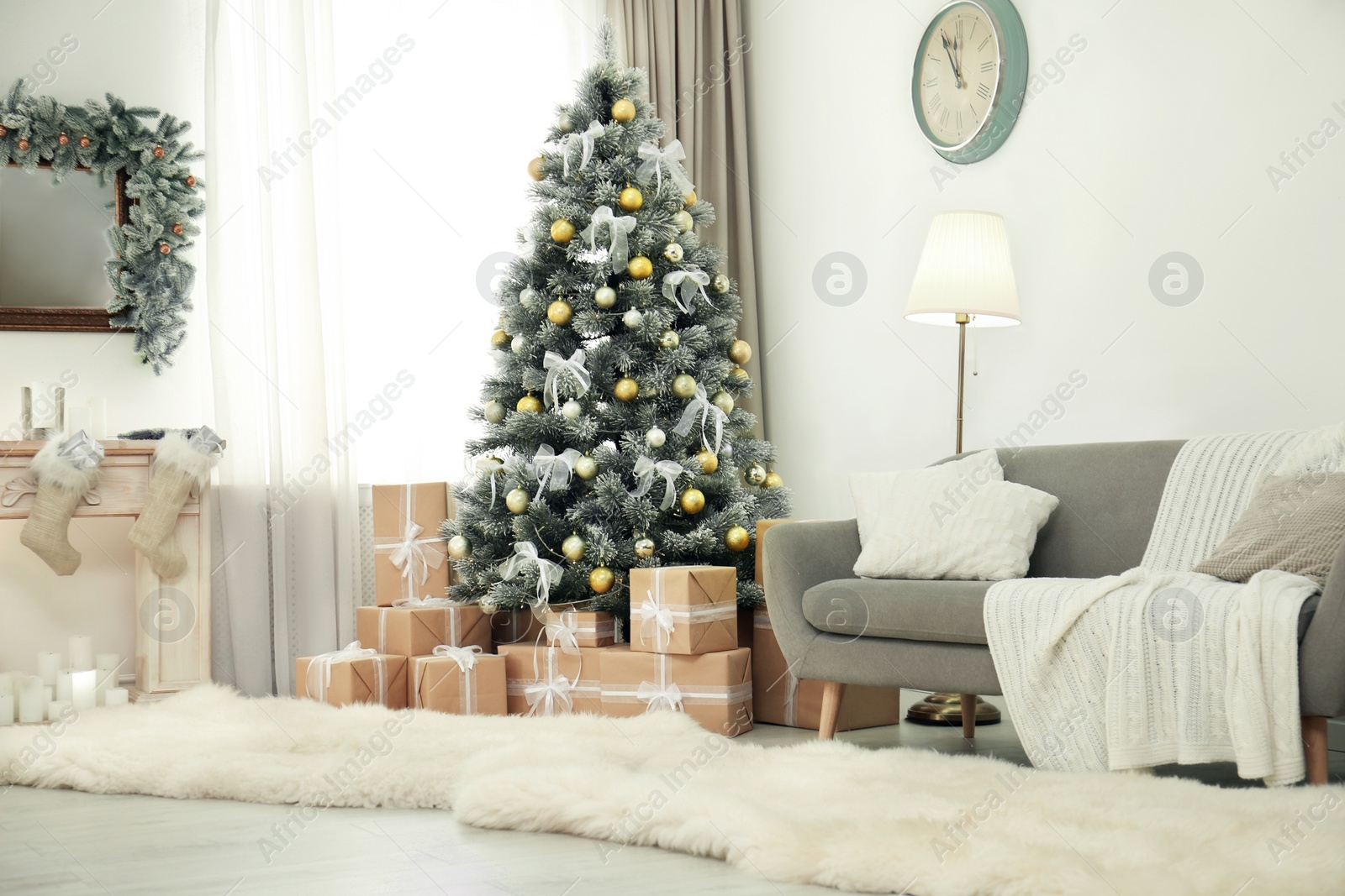 Photo of Decorated Christmas tree in modern living room interior