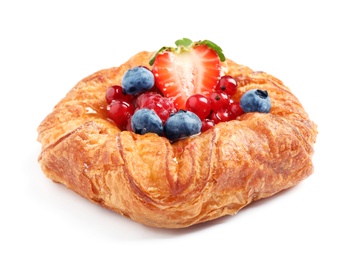 Fresh delicious puff pastry with sweet berries on white background