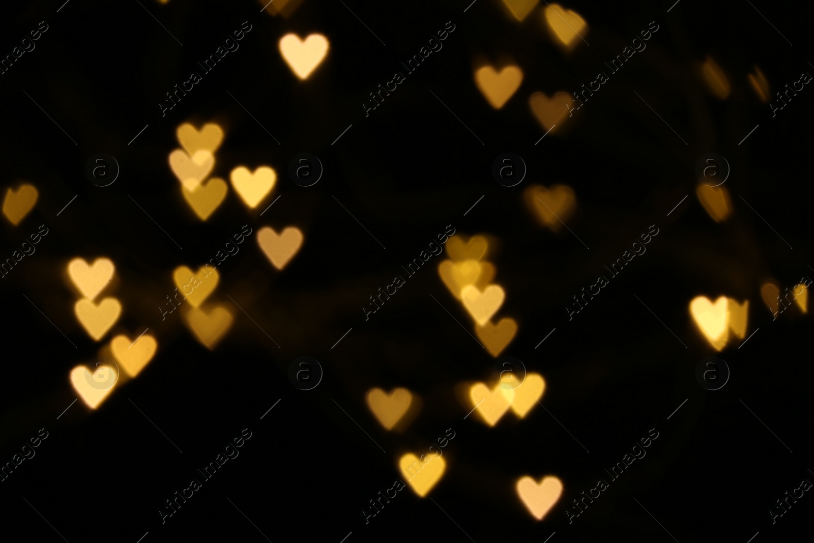 Photo of Blurred heart shaped lights as festive background