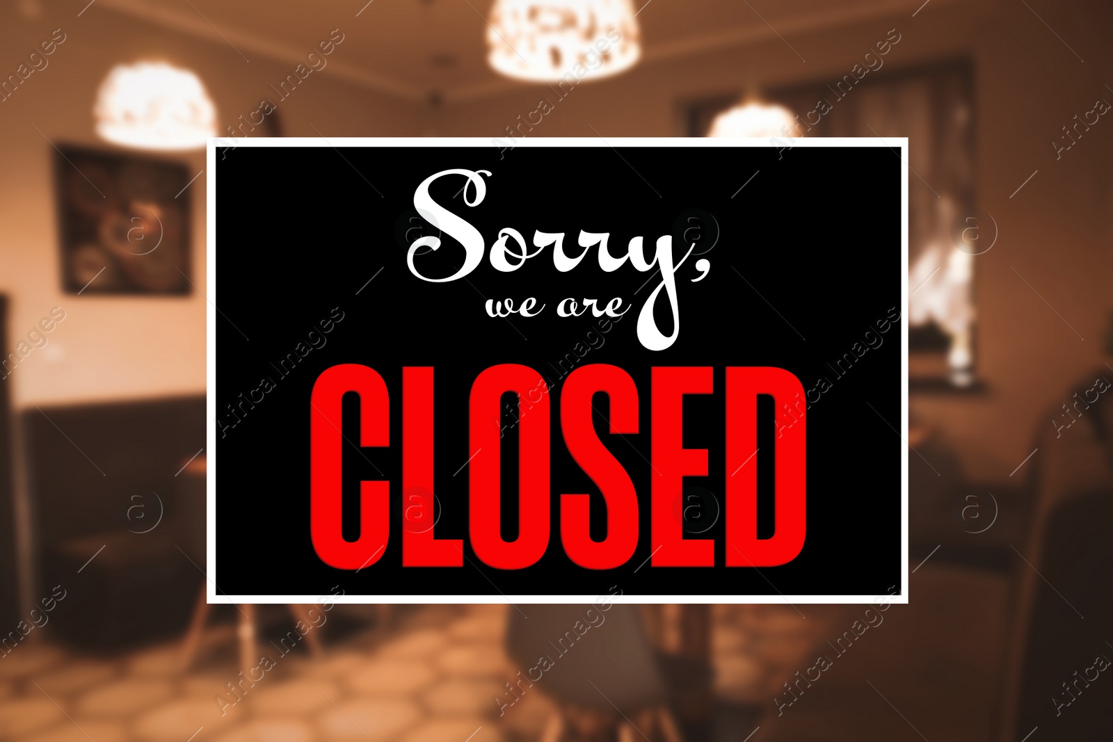 Image of Sorry we are closed sign against blurred background