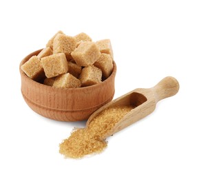 Photo of Granulated and cubed brown sugar with wooden bowl on white background