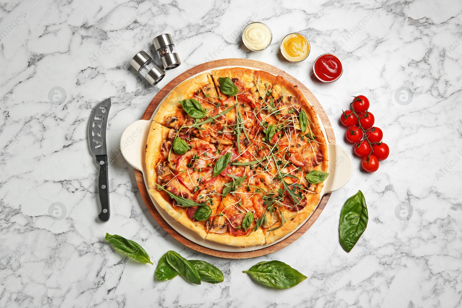 Photo of Flat lay composition with tasty homemade pizza on table