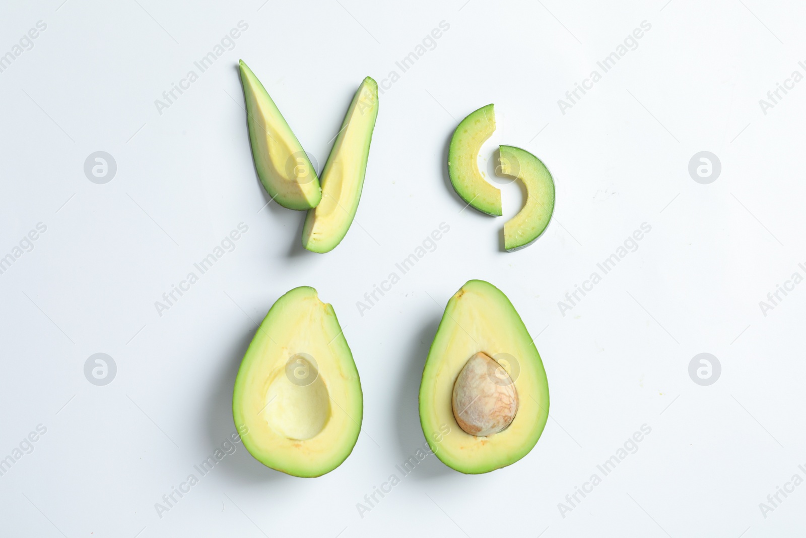 Photo of Composition with ripe fresh avocados on white background