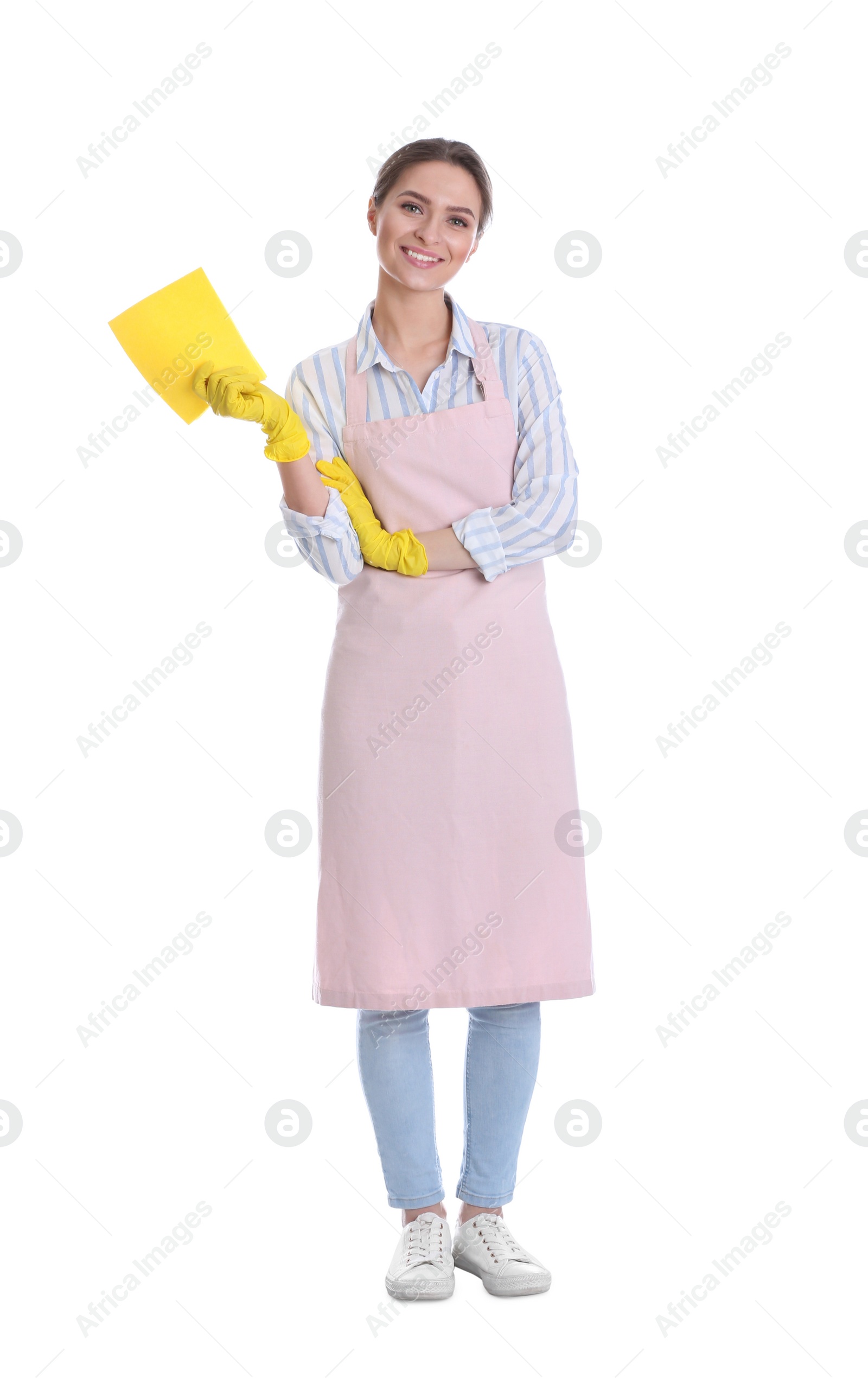 Photo of Young chambermaid with rag on white background