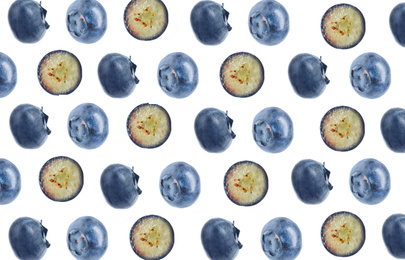 Image of Cut and whole fresh blueberries on white background