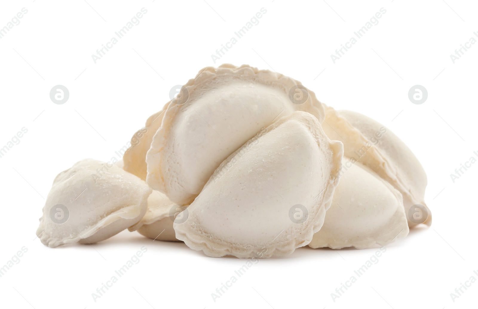 Photo of Heap of raw dumplings on white background