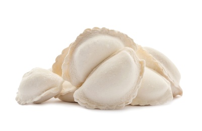 Photo of Heap of raw dumplings on white background