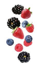 Image of Blackberries, blueberries, strawberries and raspberries falling on white background