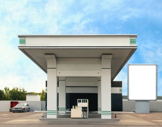 Image of Empty billboard on modern gas station outdoors, space for design