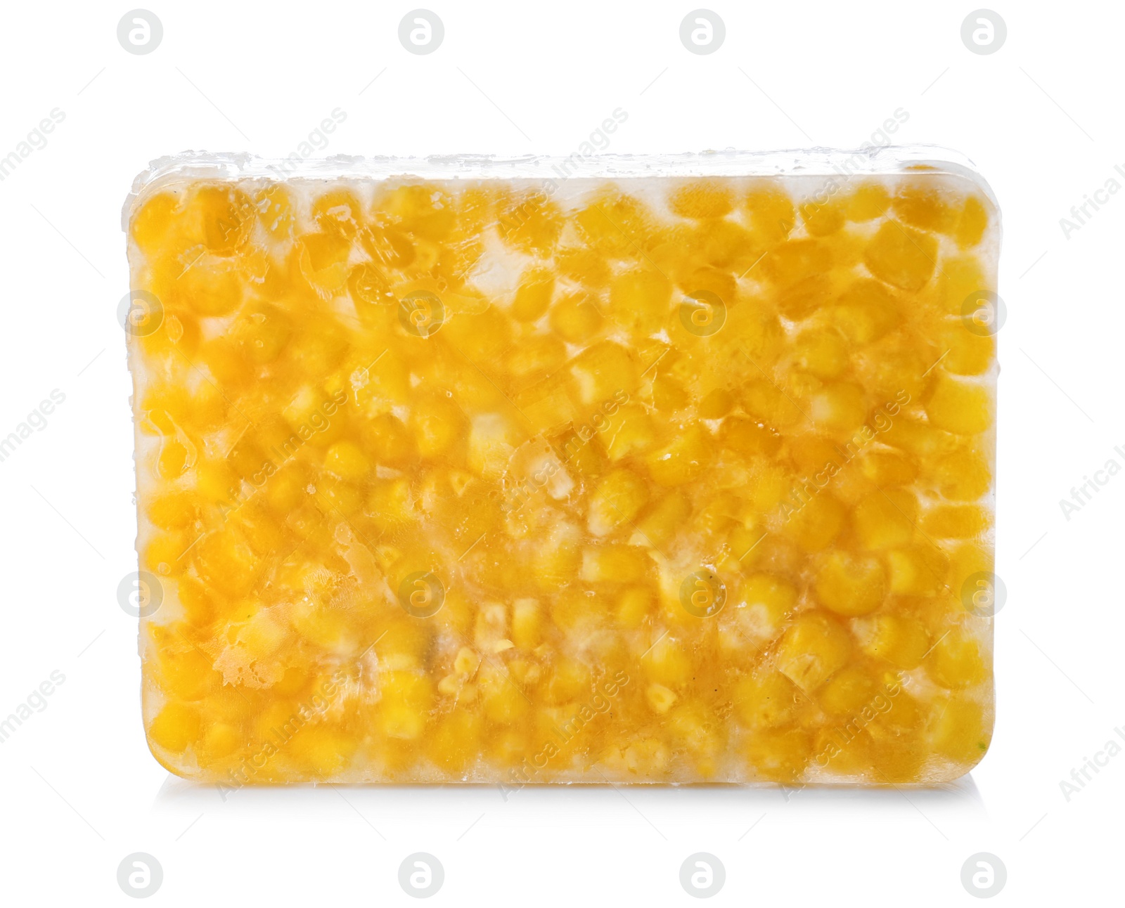 Photo of Corn grains in ice cube on white background. Frozen vegetables