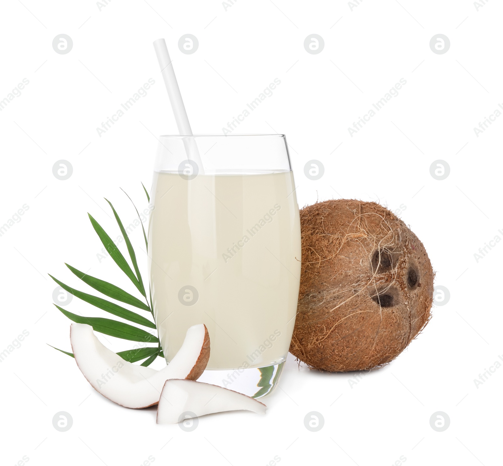 Photo of Glass of coconut water, leaf and nuts isolated on white