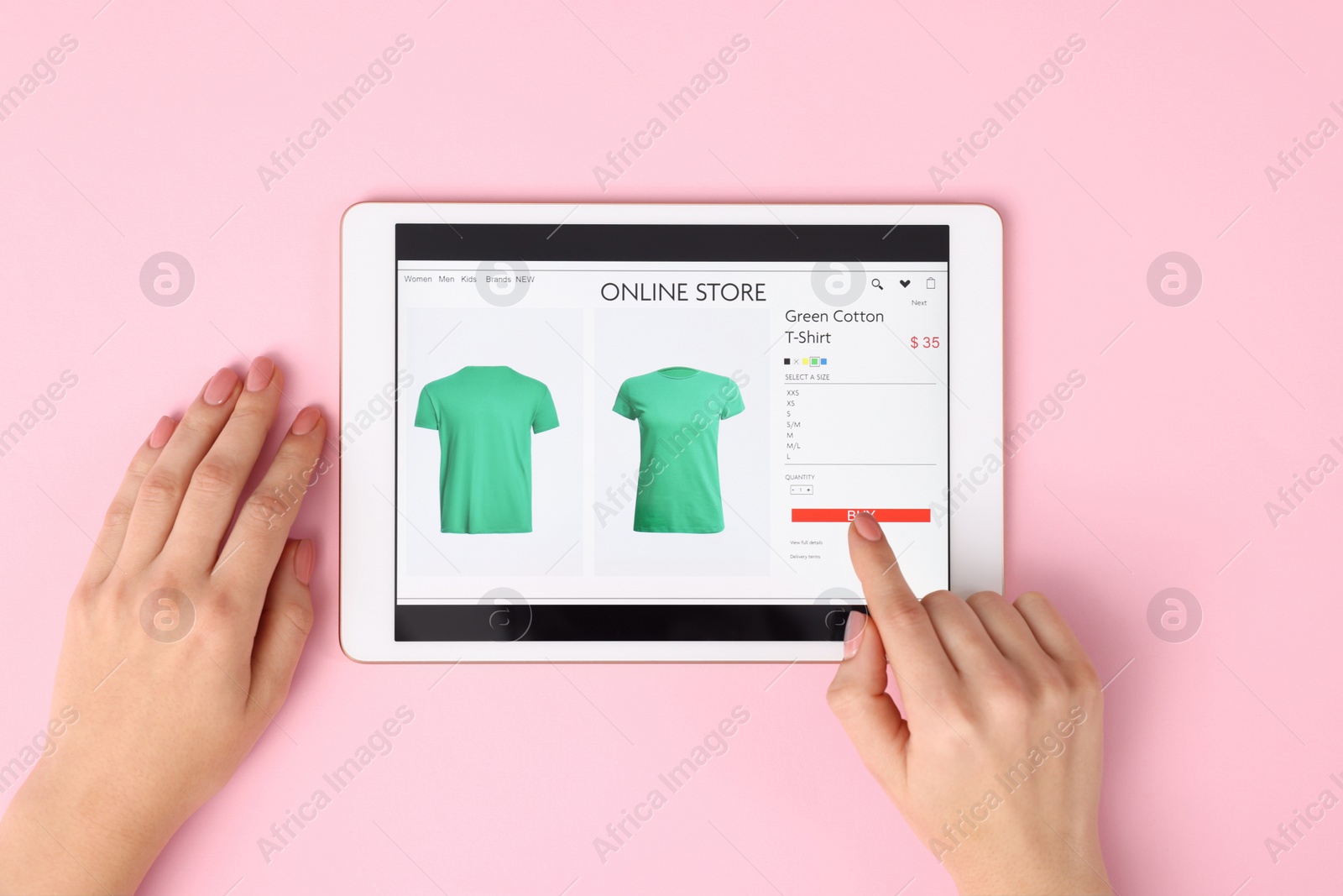 Photo of Woman with tablet shopping online on pink background, top view