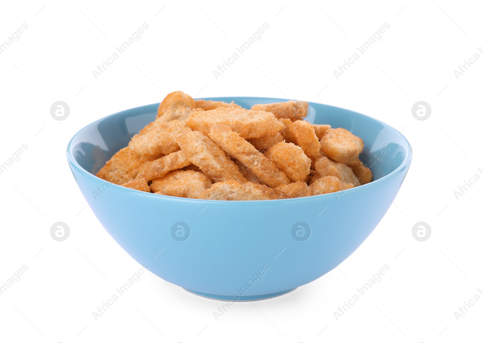 Photo of Delicious crispy rusks in bowl on white background