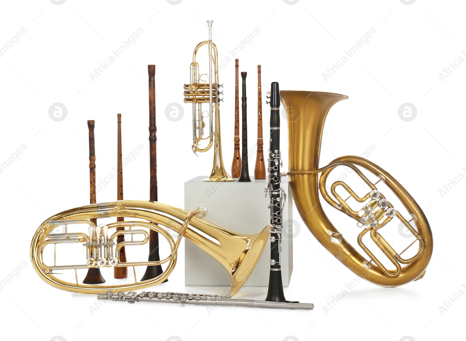 Photo of Set of wind musical instruments on white background