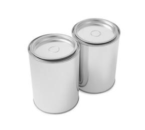 Photo of Two cans of paints on white background