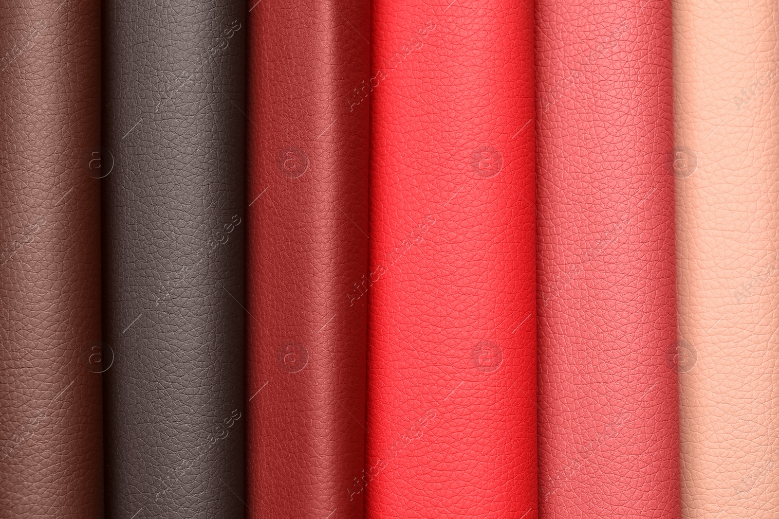 Photo of Leather samples of different colors for interior design as background