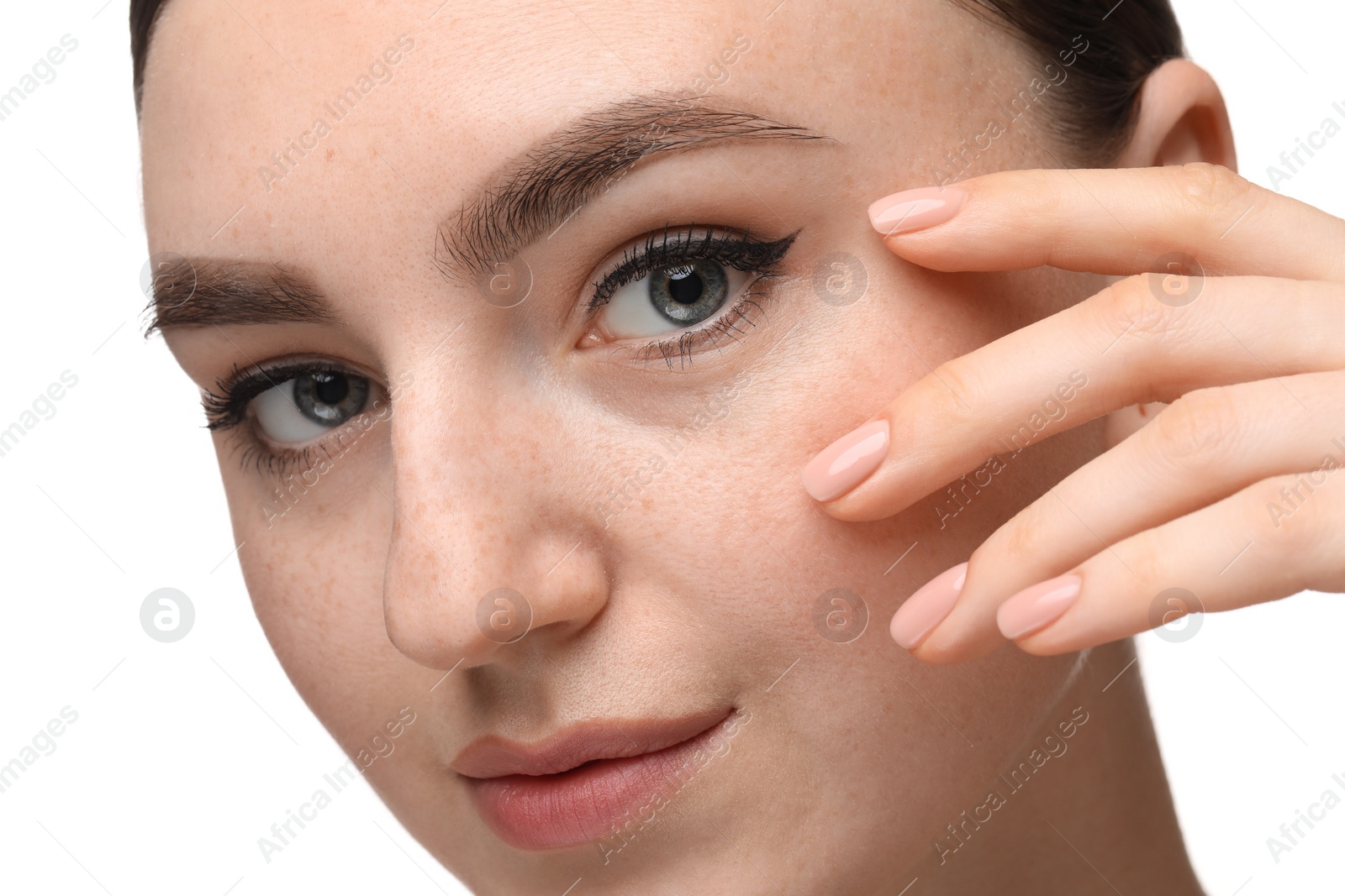 Photo of Makeup product. Woman with black eyeliner and beautiful eyebrows on white background, closeup