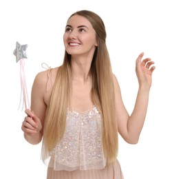 Photo of Beautiful girl in fairy costume with magic wand on white background