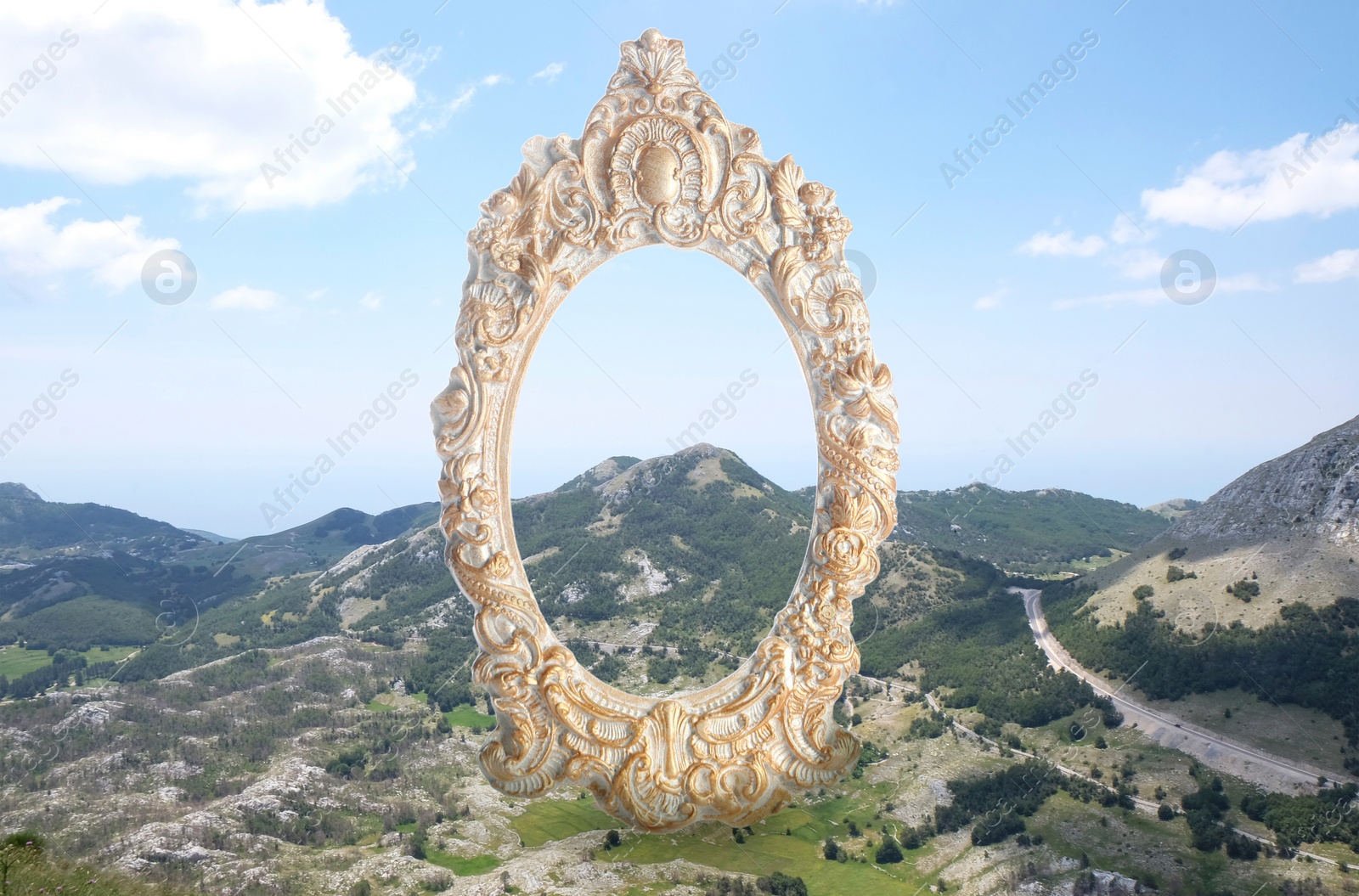 Image of Vintage frame and beautiful mountains under blue sky with clouds