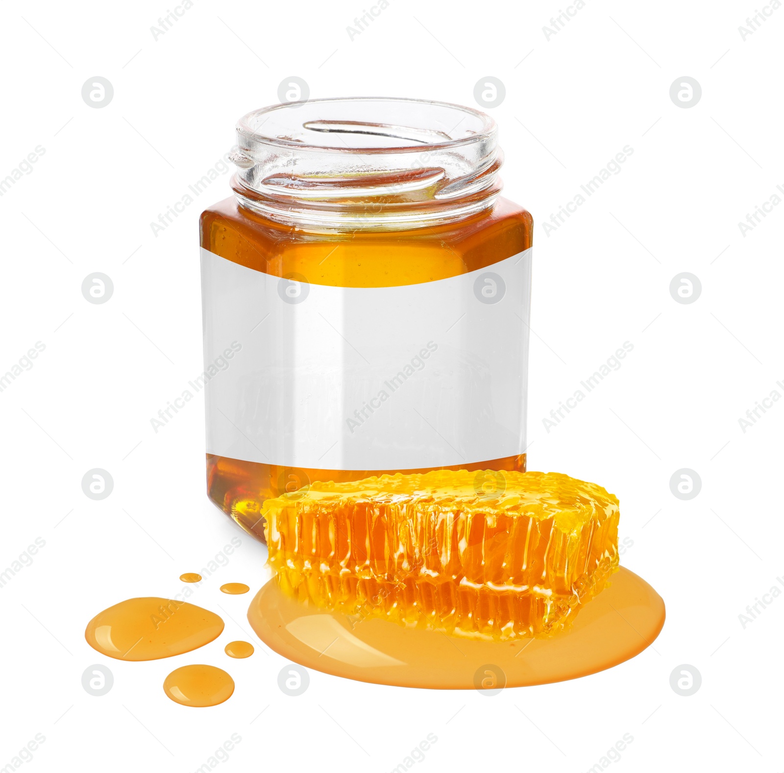 Image of Sweet honey in glass jar with blank label and piece of honeycomb on white background. Mockup for design