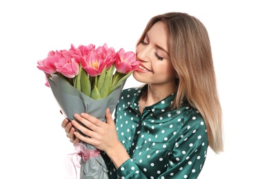 Photo of Portrait of smiling young girl with beautiful tulips on white background. International Women's Day