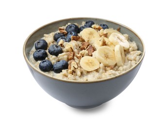Tasty oatmeal with banana, blueberries, milk and walnuts in bowl isolated on white