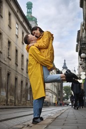 Lovely young couple together on city street