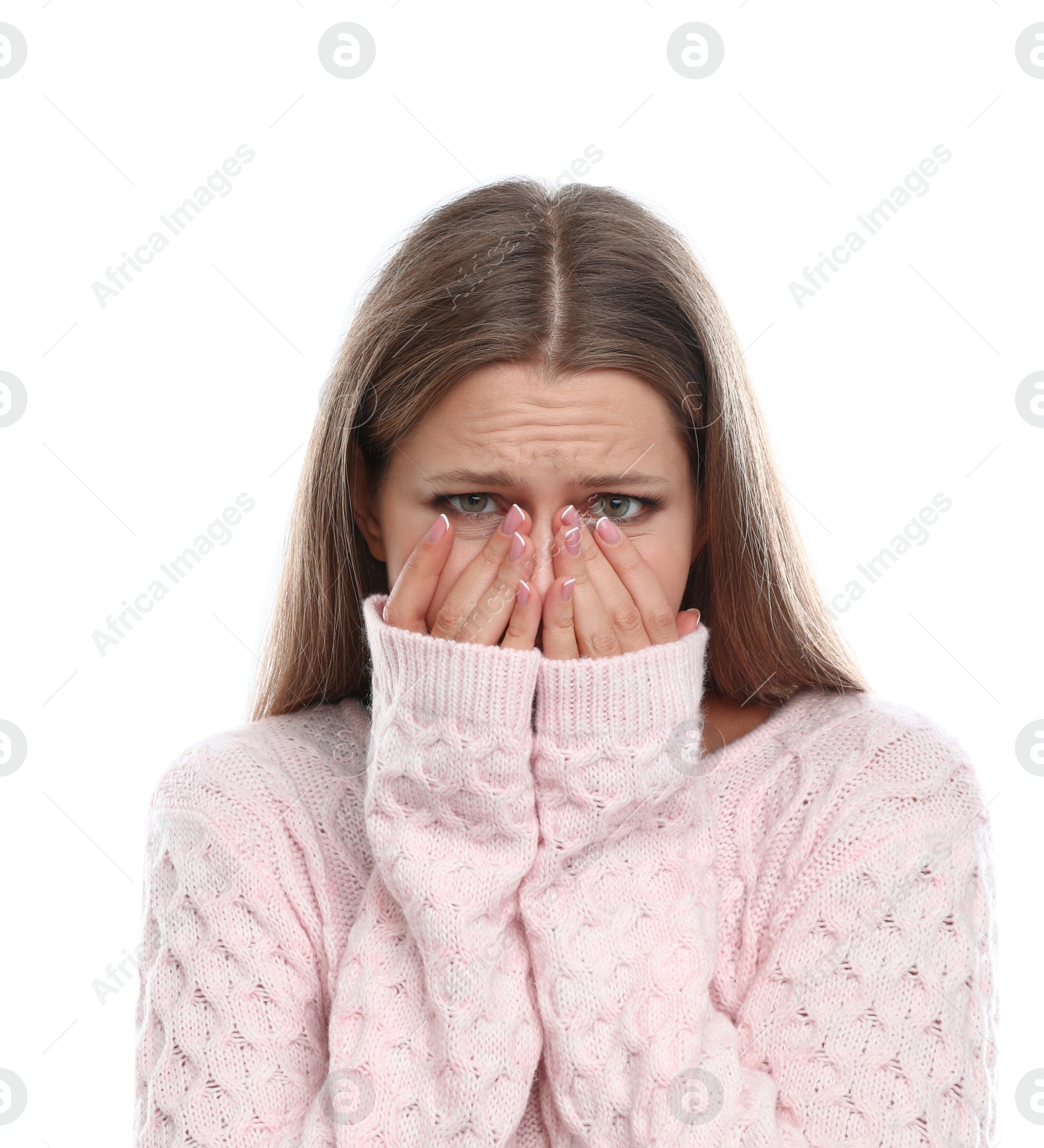 Photo of Young woman suffering from cold on white background